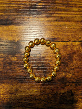 Load image into Gallery viewer, Gold faceted hematite - Beaded Bracelet