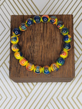 Load image into Gallery viewer, Yellow w/ blue & orange streaks - Beaded Bracelet