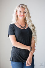 Load image into Gallery viewer, Rosy Rosette - Black - Set - Paparazzi Accessories