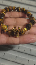 Load and play video in Gallery viewer, Faceted Tiger Eye w/ Crown - Beaded Bracelet
